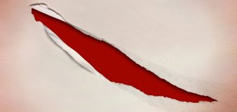 Foto: Werbebanner des Theaters Erfurt © Theater Erfurt eine Papierwand, in der ein Sehschlitz gerissen ist