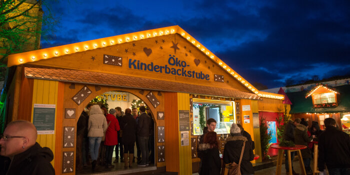 Illuminated stall with gingerbread decoration